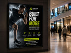 Backlit film poster in an illuminated lightbox inside a shopping centre, advertising sportswear