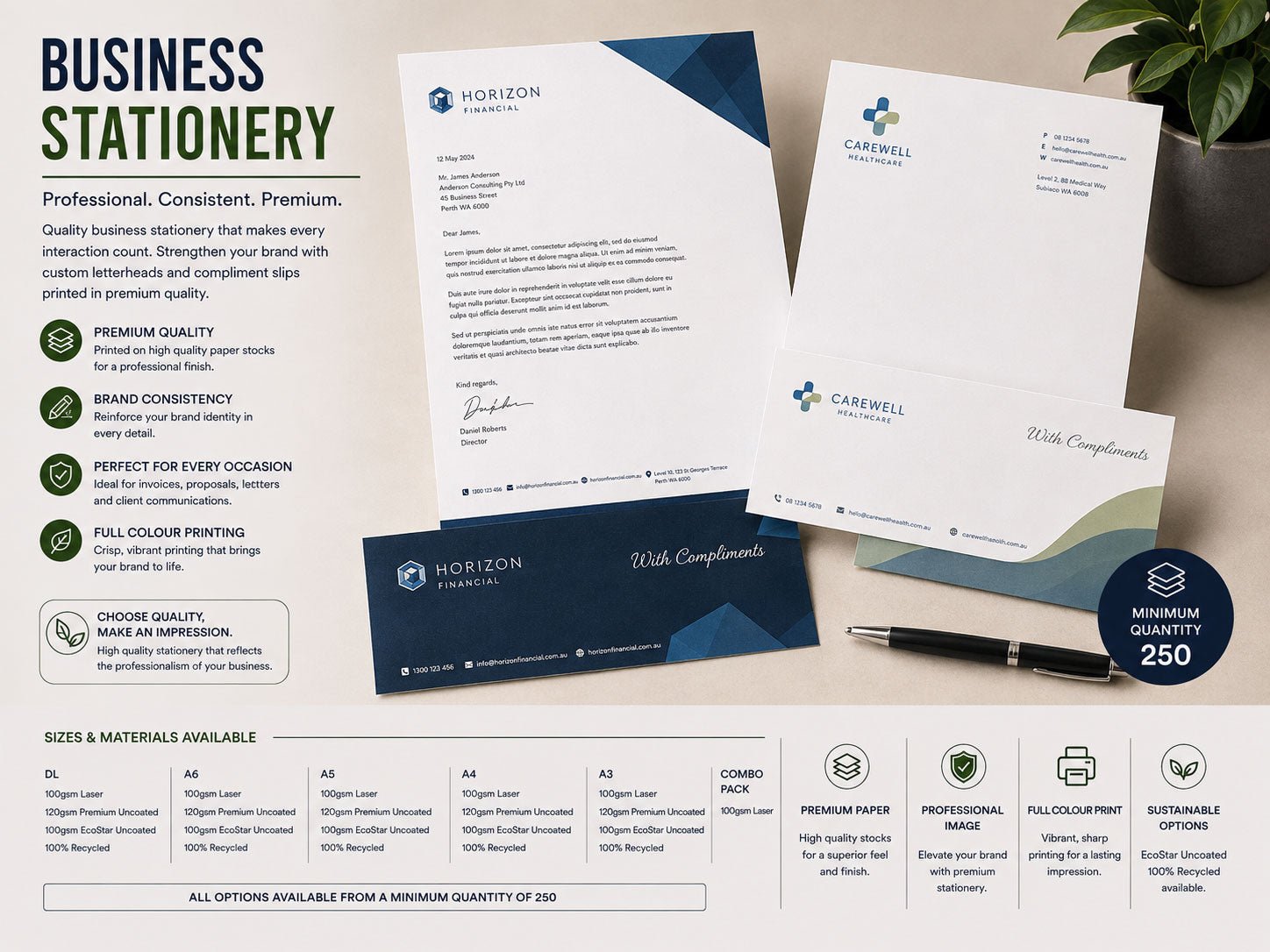 Business stationery set with printed letterheads, compliment slips and envelopes arranged on a desk beside a pen