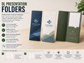 Three DL presentation folders in navy, white and dark green standing upright on a desk, one open to show the pocket