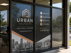 One way vision window graphics covering the glass frontage of a real estate office, seen from outside