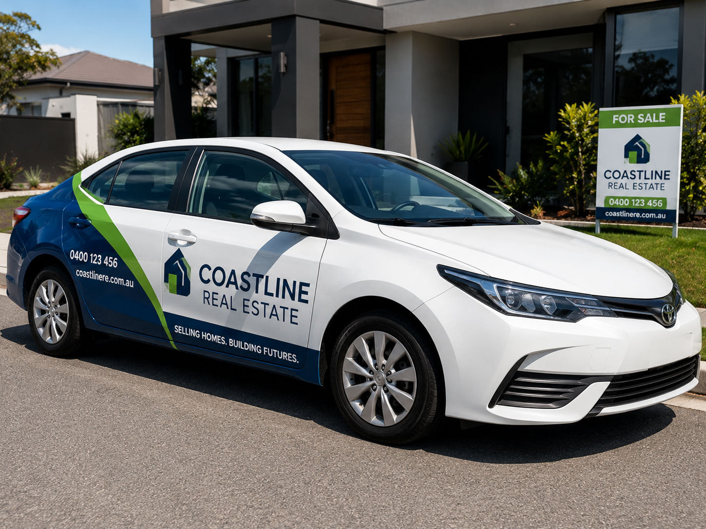 Partial vehicle wrap on a white real estate sedan parked outside a home with a matching for sale sign