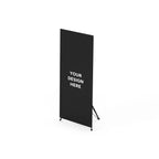 X frame tripod stand holding a plain black banner reading Your Design Here