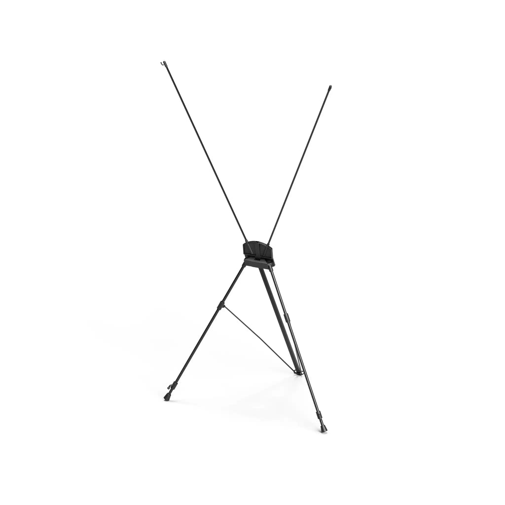 Black X frame tripod stand standing empty, showing the X shaped arms that tension the banner