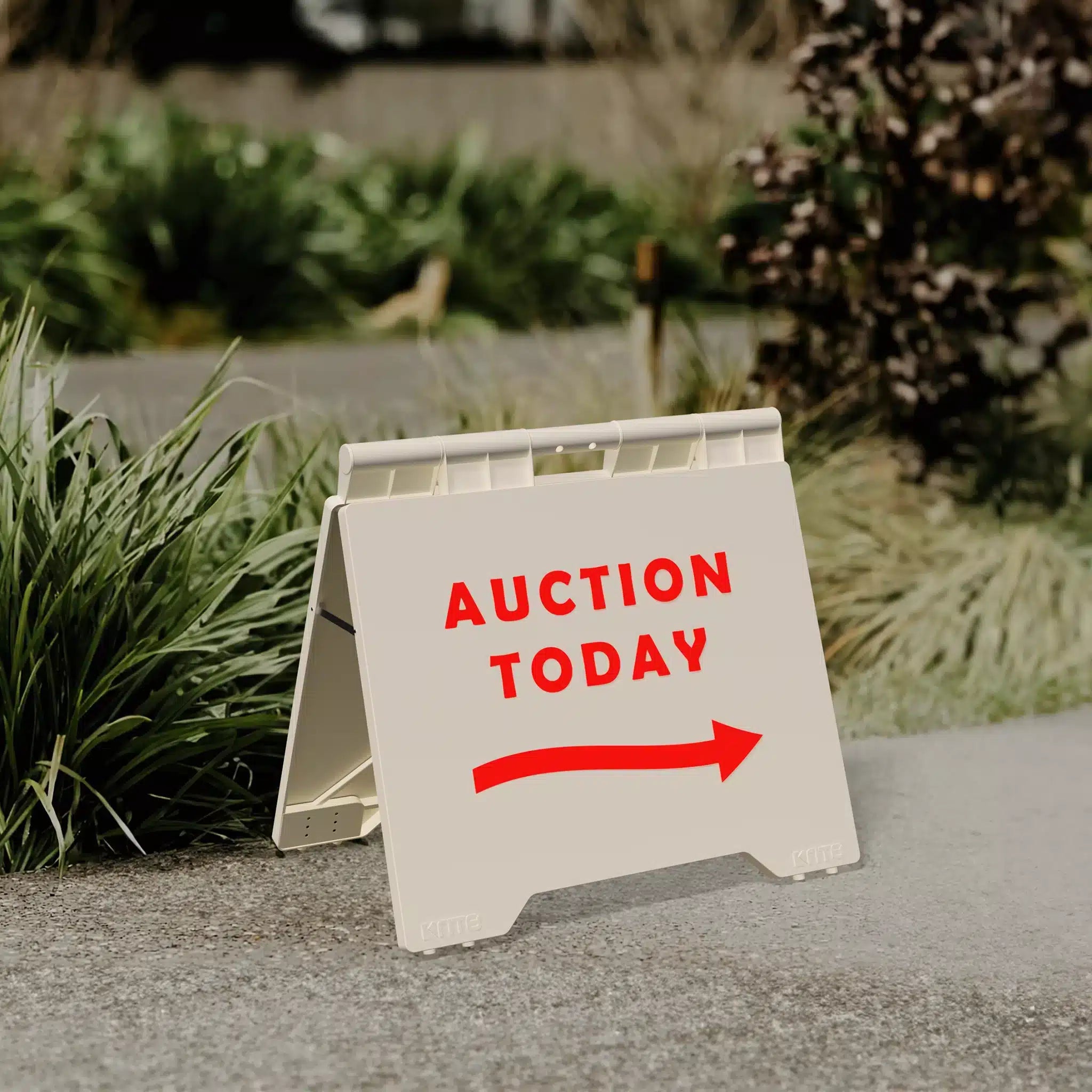 White Evarite A-frame with an auction today message