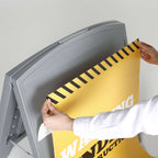 Sliding a printed panel into the Mini Street SignPro frame