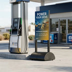 Promotional sign on a water-fill base at a service station